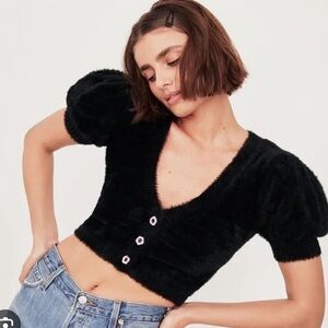 Fluffy and stretchy true to size. Never worn out of the house.